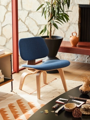 Eames® Moulded Plywood Lounge Chair with upholstered Seat by Herman Miller